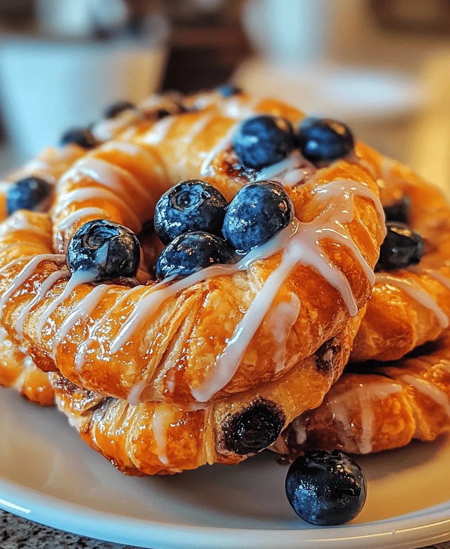 Puff pastry is a marvel of culinary engineering. Its unique texture is achieved by incorporating layers of butter between layers of dough, which create steam when baked. This steam causes the layers to puff up, resulting in a light and flaky pastry that is perfect for various sweet and savory dishes. The versatility of puff pastry makes it an ideal base for our Blueberry Pastry Rings, as it can hold up the filling while providing a delightful contrast to the creamy vanilla cream.