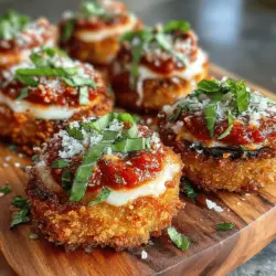 Mini Eggplant Parmesan Bites are a delightful twist on the classic Italian comfort food, offering the rich flavors of traditional Eggplant Parmesan in a convenient, bite-sized format. These savory morsels are not only appealing to the eye but also incredibly versatile, making them an ideal appetizer for any occasion—be it a casual gathering, festive celebration, or simply a cozy night in. The beauty of this recipe lies in its ability to cater to a variety of palates while delivering a satisfying bite that captures the essence of Mediterranean cuisine.