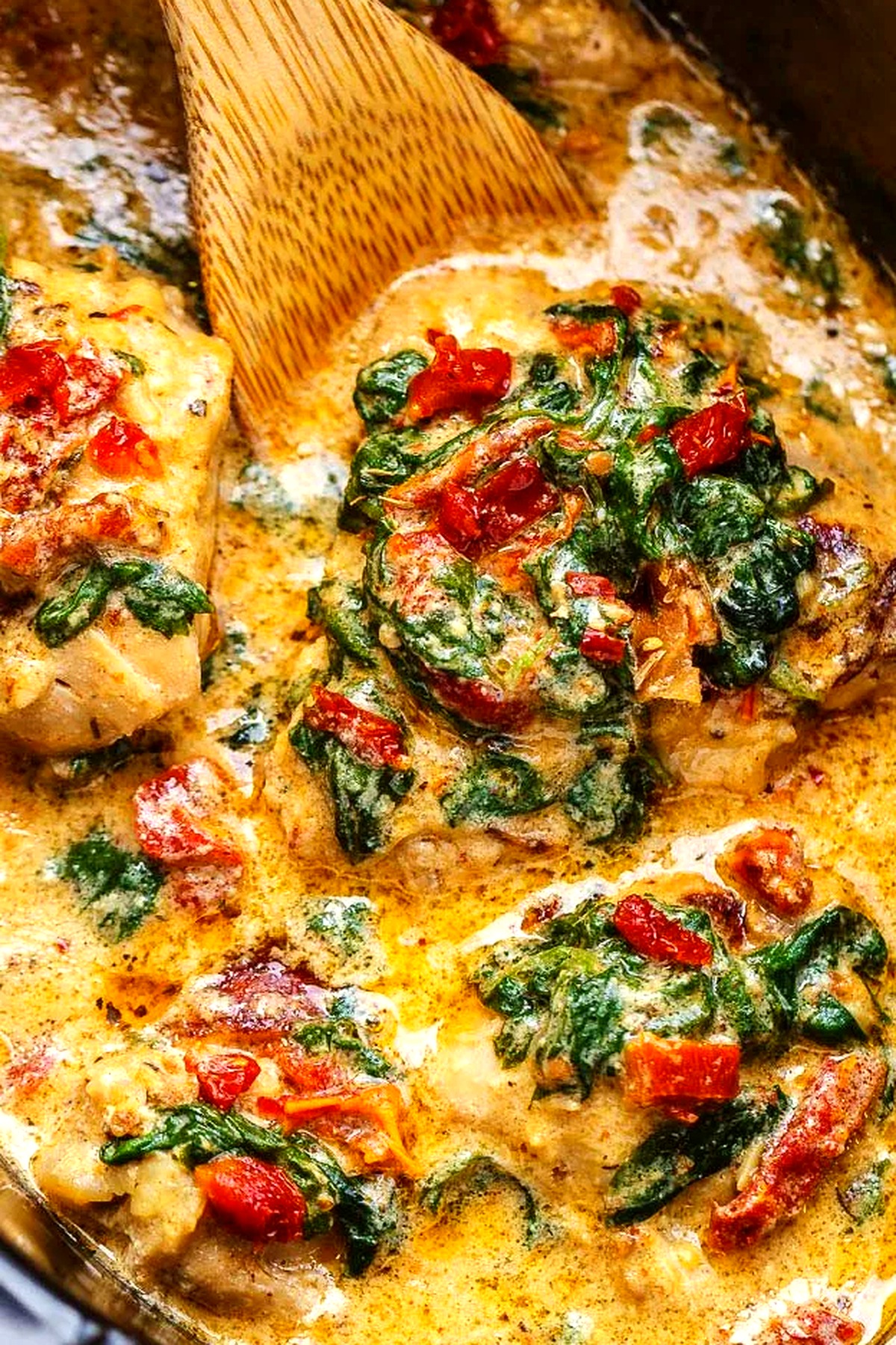Crockpot Tuscan Garlic Cream Chicken with Sun-Dried Tomatoes and Spinach