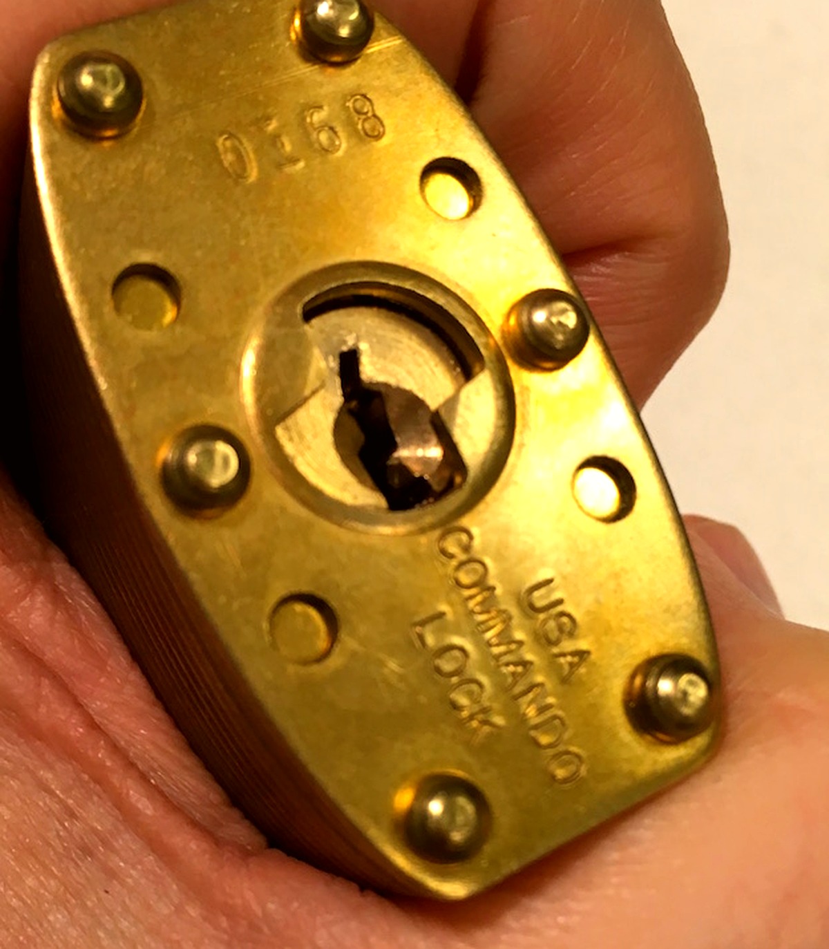 What the Tiny Hole Near the Bottom of a Padlock Is Engineered For